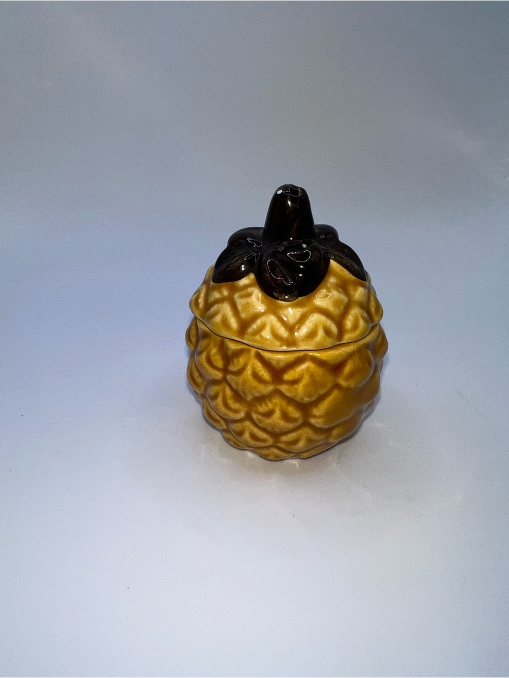 Vintage ceramic or majolica-style pineapple jam jar or sugar pot with a lid